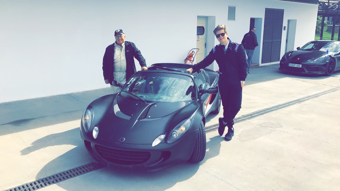 Joshua with client and Lotus sports car